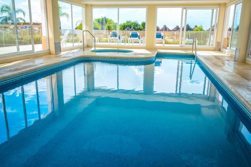 Howard Johnson Resort Spa & Convention Center Villa de Merlo Exterior photo